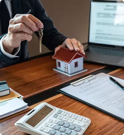 A man displays a house key